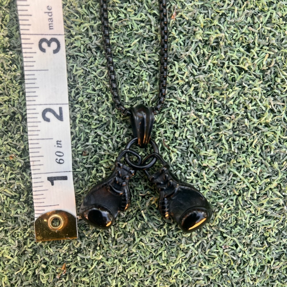 Men’s boxing gloves on chain